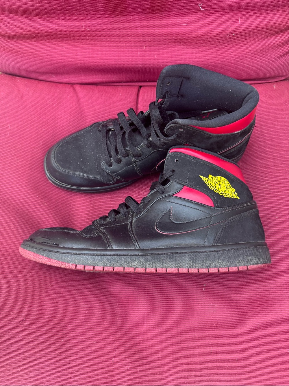 Nike Black and Red High-Top Sneakers with Yellow Logo